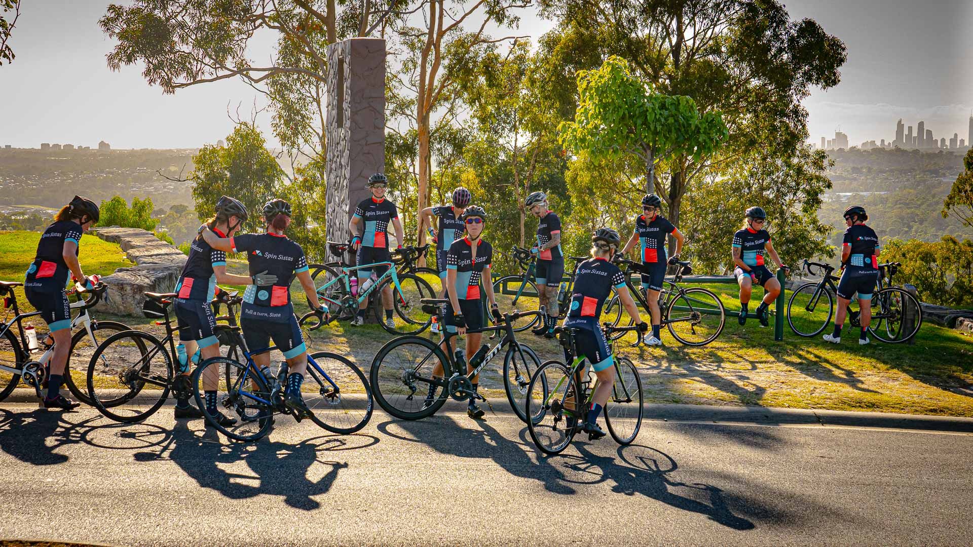 Spin Sistas gathered with their bikes near the Gold Coast waterfront